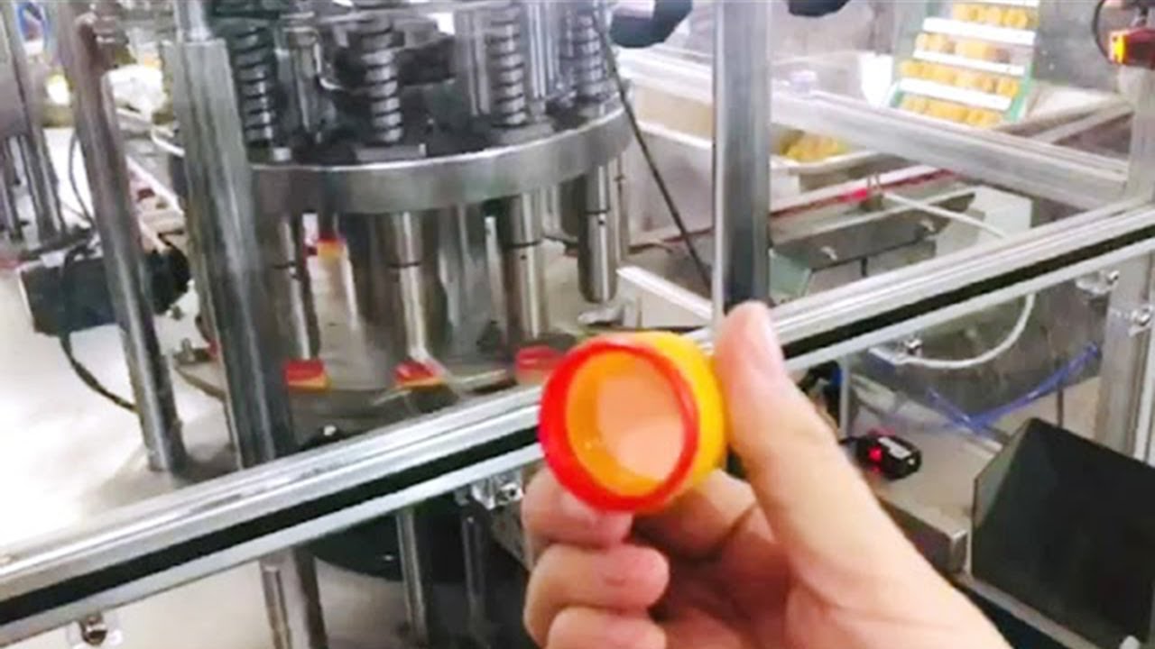 two heads caps wadding machine with cap lifting system assembler equipment