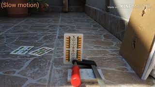 Cutting playing cards half with airsoft bb