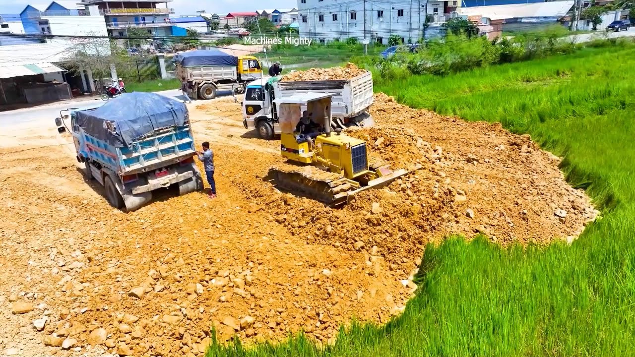 Operating Skills Bulldozer D31p Working, Dump Truck Unloading