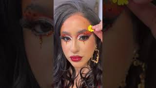 Should I do more makeup tutorials?  #makeuptutorial #orangeandyellow #flowermakeup