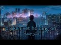 broken yet holding on مترجمة