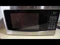 Insignia Countertop Microwave - 1.2 Cu. Ft. - Stainless Steel/Black Never Used just NO BOX