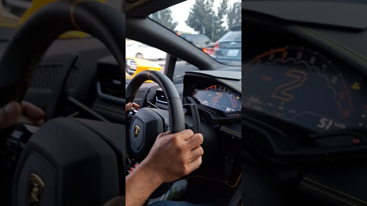 Swimming through the traffic in a Lamborghini! 
