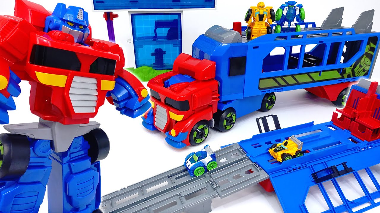 spielzeugregal Transformers Rescue Bots Optimus Prime Trailer Flip Racers~! #ToyMartTV
