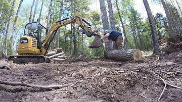 Welding a hook on a mini excavator bucket