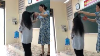 Dân mạng xôn xao với clip Cô giáo cắt tóc học sinh ngay trên bục giảng