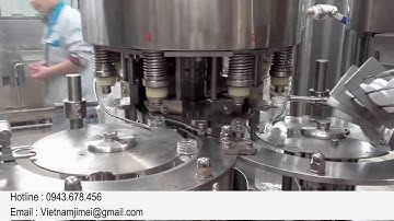 Máy chiết rót nước khoáng đóng chai tự động ( phun mưa - chiết rót - đóng nắp )