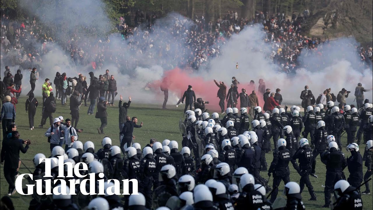 Riot police break up illegal party in Brussels park using tear gas and water cannon
