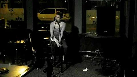Peri Jill performing at open mic
