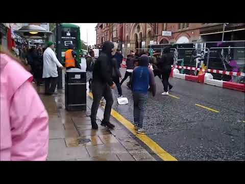 “Time to wake up England” clip shows man being attacked during mass street brawl