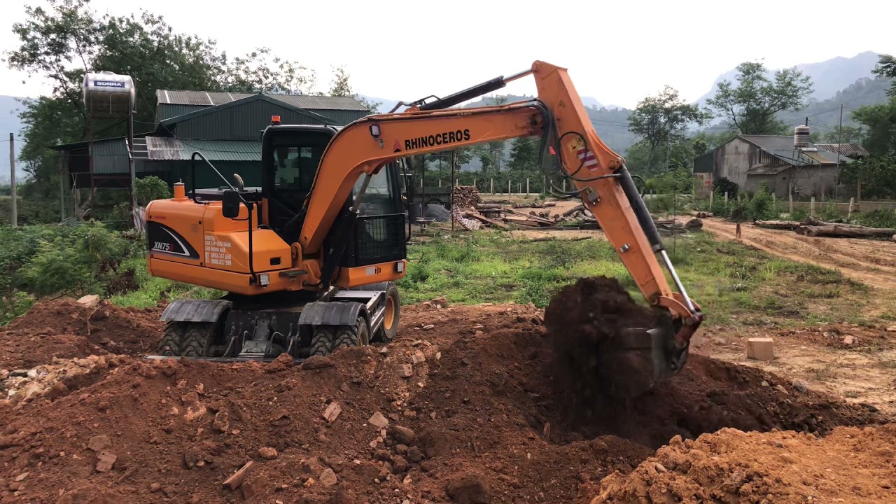 Máy xúc đào bánh lốp XN75B thương hiệu RHINOCEROS san lấp mặt bằng, LH: 0967162497.