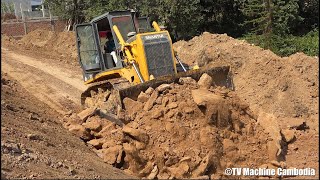 Stronger Dozer Spreading Dirt On Road With Dumping Load Of Dirt គ្រឿងចក្រធ្វើផ្លូវ