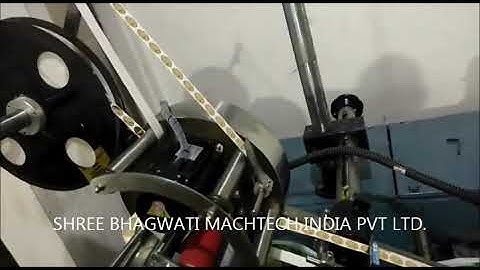 Pouch Roll Rewinder with Label applicator , pouch roll rewinding with Hologram labeling machine