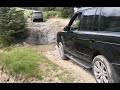 Strata florida  the bomb hole  wales  two stock range rovers green laning