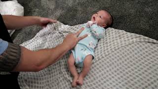 How to Swaddle a Baby with a Muslin Blanket