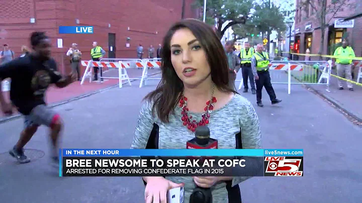 VIRAL: Confederate flag taken down by protester during live shot