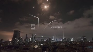 Explosions and interceptions in Tel Aviv area as Iran announces new barrage of missiles