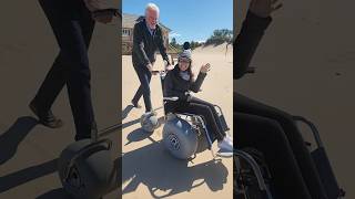Rolling in a beach wheelchair at Ludington State Park on Lake Michigan ￼