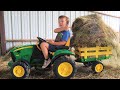 Using tractors to get hay out of the barn before storm comes | Tractors for kids