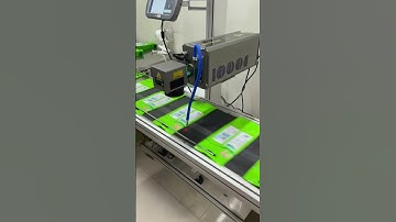 CO2 flying laser marking machine working with paging machine for marking on on plastic food package