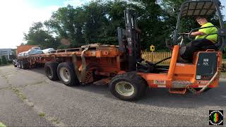 Teaching a rookie how to mount a $100k Moffett Forklift on our trailer!