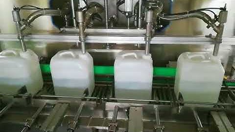 Net weight oil filling capping machine video for jerry can, tin can, plastic bucket