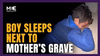 Palestinian boy sleeps next to mother’s grave every night in Gaza