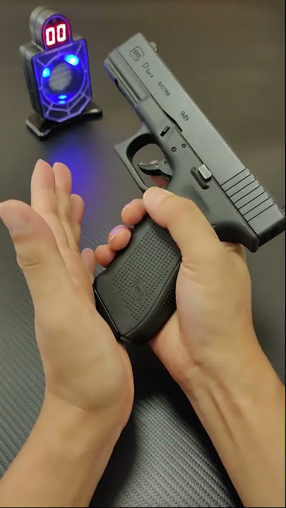 Glock 17 Auto Shell Ejection Blowback Laser Toy Gun -Link In Comment