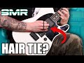 WHY JIM ROOT WEARS A HAIR TIE ON HIS HAND
