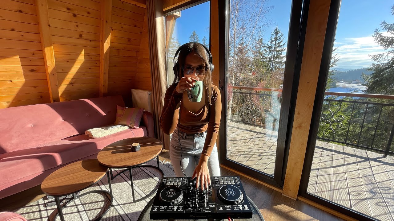 Playing Funky House Music In A Cozy Wooden Cabin