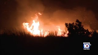 West Miami-Dade brush fire continues to burn