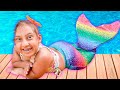 Maria Clara Turns into a Mermaid and Has Fun in the Swimming Pool – MC  Divertida 