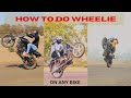 How to do wheelie on any bikewheelie tutorial satendra dhakad stunts shivpuri stuntnewsindia