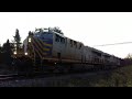 Pair of ex crex gevos lead extra manifest train cn 473 at berry mills nb