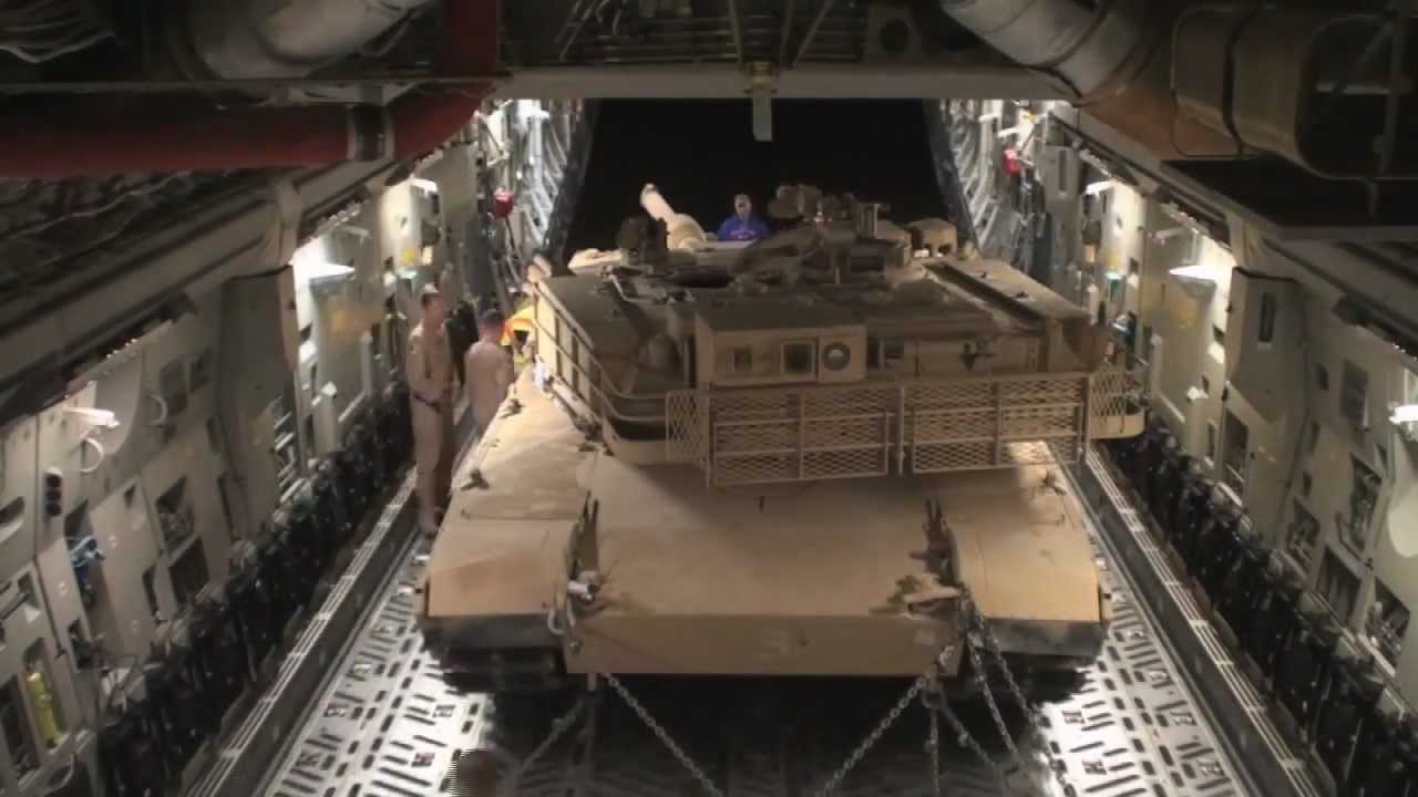 Airmen Load Abrams Tank onto C-17 Globemaster III