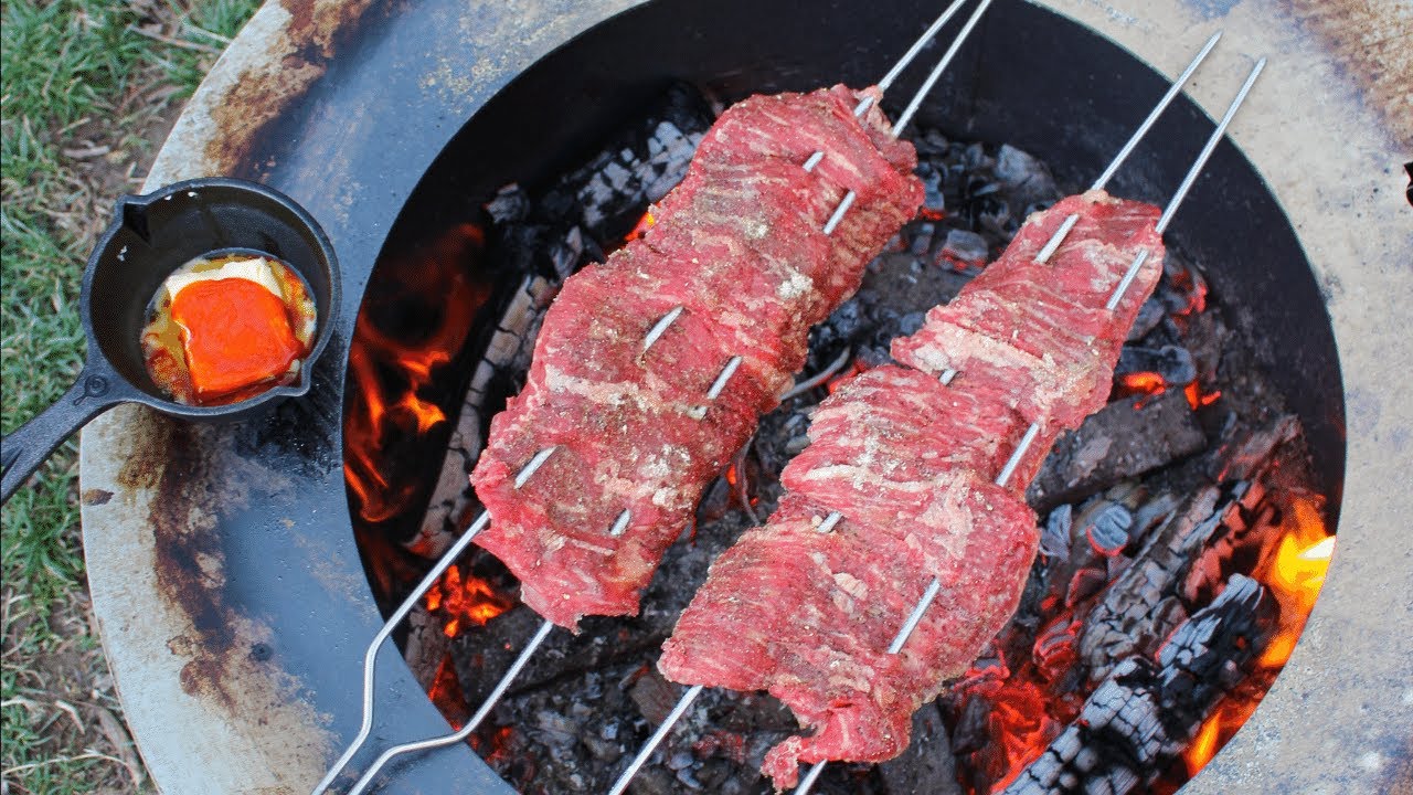 Cheesy Skewered Skirt Steak with Salsa Verde Recipe | Over The Fire Cooking #shorts