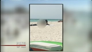 Caught on video: Couple arrested after sex on the beach, police say