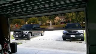 Motorized garage screen