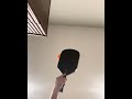 Ambidextrous pickleball juggling using the brush the ball method from floor POV