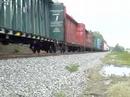 My 1st railfan vid. CSX mixed freight caught Northbound into South Farmersburg, Indiana. This is at Sawmill Road crossing. I hope you likes! Please rate and ...