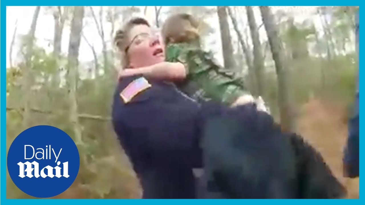 Terrified four-year-old boy rescue in woods with dog captured on police ...