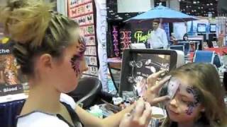 Airbrush face painting with Stencil eyes