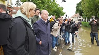 German Chancellor Scholz visits flood-hit area after heavy rain in Saarland region | AFP