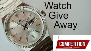 Competition, Watch Give Away