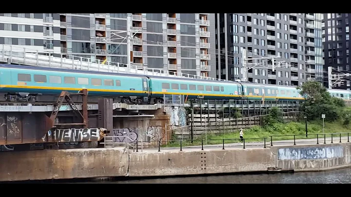 TRAINS Via Rail Renaissance Coaches With Slogan Wrap P42DC at Peel Basin Bridge