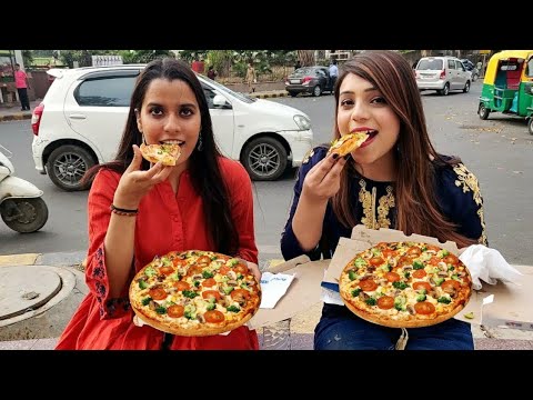 वीडियो: आप पिज्जा कैसे खाते हैं