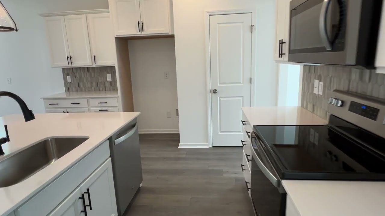 Unlock the perfect home: Primary suite downstairs in a serene Raeford neighborhood - 125 Woodsrun