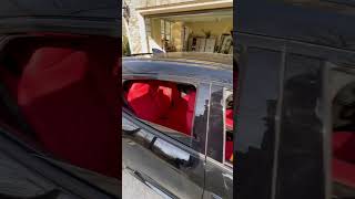 Custom red leather/black diamond stitch seat covers on Civic Hatchback.