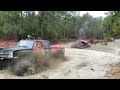Crew cab squarebody chevy on 44 boggers yanking someone out