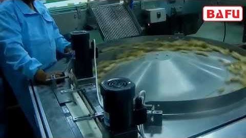 rotary feeder, auto feeding, high speed rotary bowl feeding, flow pack, flow wrapper